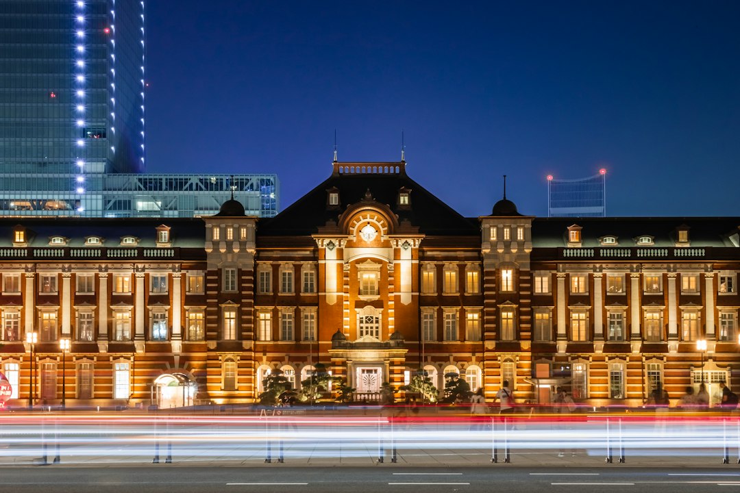 a large building with a lot of lights in front of it